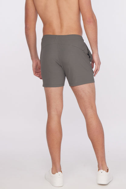 Gray textured stretch performance shorts with sleek modern design and subtle side pockets for athletic use