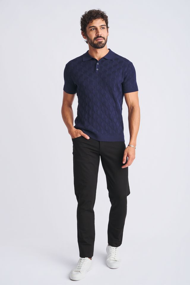 Navy blue short-sleeved polo shirt with textured stripes made of silk and tencel featuring a classic collar and buttoned placket