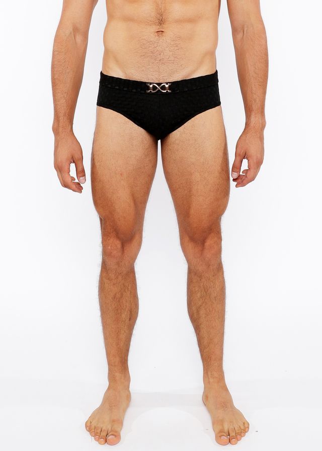 Black textured swim brief with a silver metallic double-x front buckle for stylish swimwear use