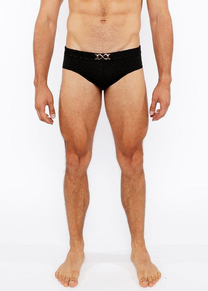 Black textured swim brief with a silver metallic double-x front buckle for stylish swimwear use