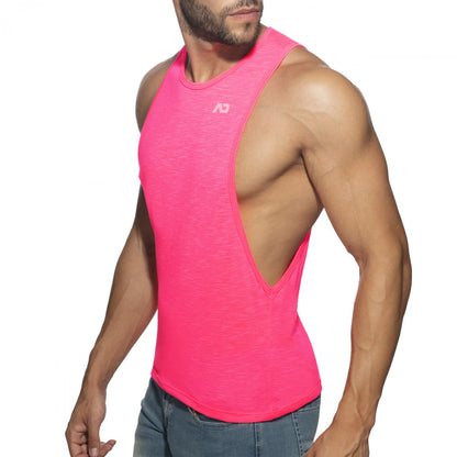 Bright pink thin flame low rider athletic tank top with distinctive cutout back and subtle brand logo on chest front view