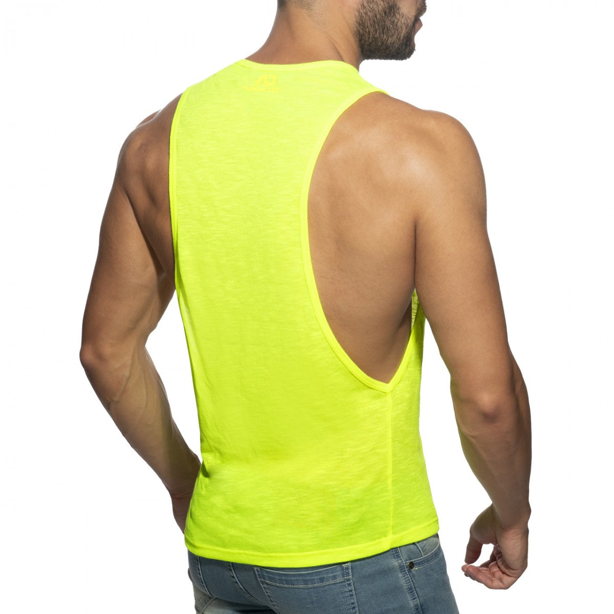 Bright neon yellow sleeveless tank top thin flame low rider with a deep back cutout shown from the back side