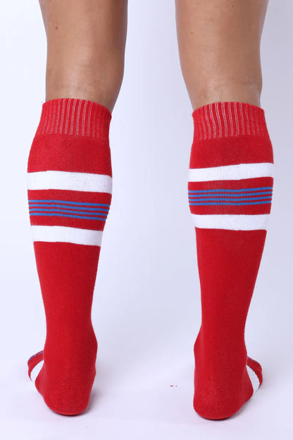 Tight end knee high socks in red with white and blue stripes designed for athletic use and comfortable fit