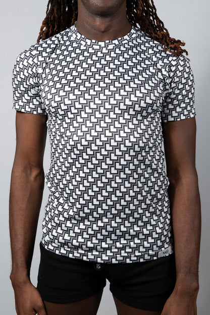 Black and white geometric-patterned short-sleeve rash guard tile print tee for sun protection and water sports