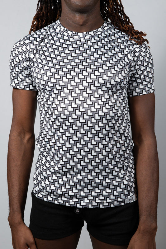 Black and white geometric-patterned short-sleeve rash guard tile print tee for sun protection and water sports