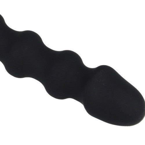 A black, textured novelty item with rounded bumps along its shaft.