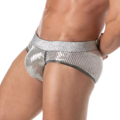 Silver glitter brief with a shiny finish and elastic waistband worn by a model designed by TOF Paris