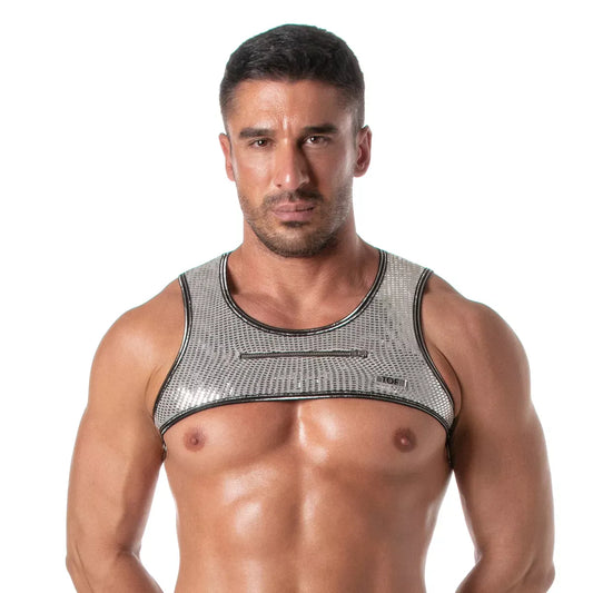 Silver glitter zipped harness made of shiny material worn by a model with a muscular build showcasing a bold design by TOF Paris