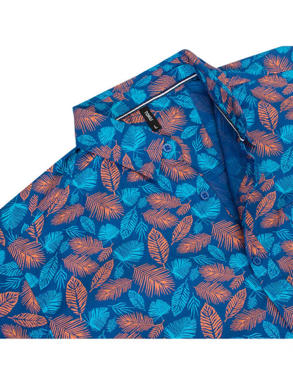 Toku palm print shirt featuring vibrant blue and orange tropical leaf pattern in button-down style