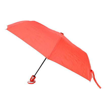 A vibrant coral travel umbrella with a sleek black handle and red clip-on base for compact use