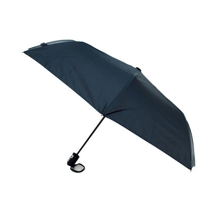 Dark navy travel umbrella with foldable design, sleek black handle, and convenient clip for easy carrying