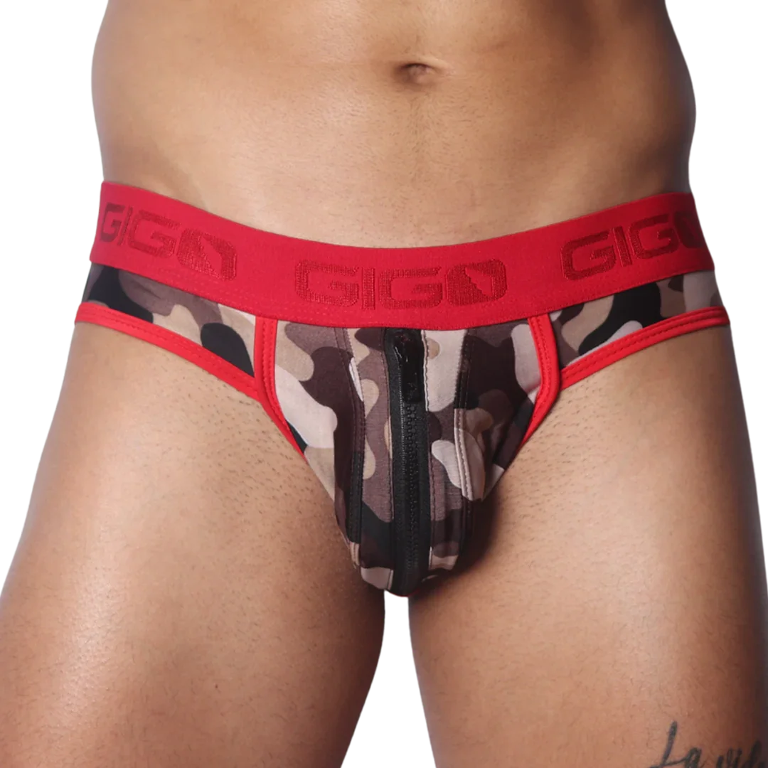 Camo print jockstrap with a front vertical zipper, red trim, and a branded red elastic waistband.