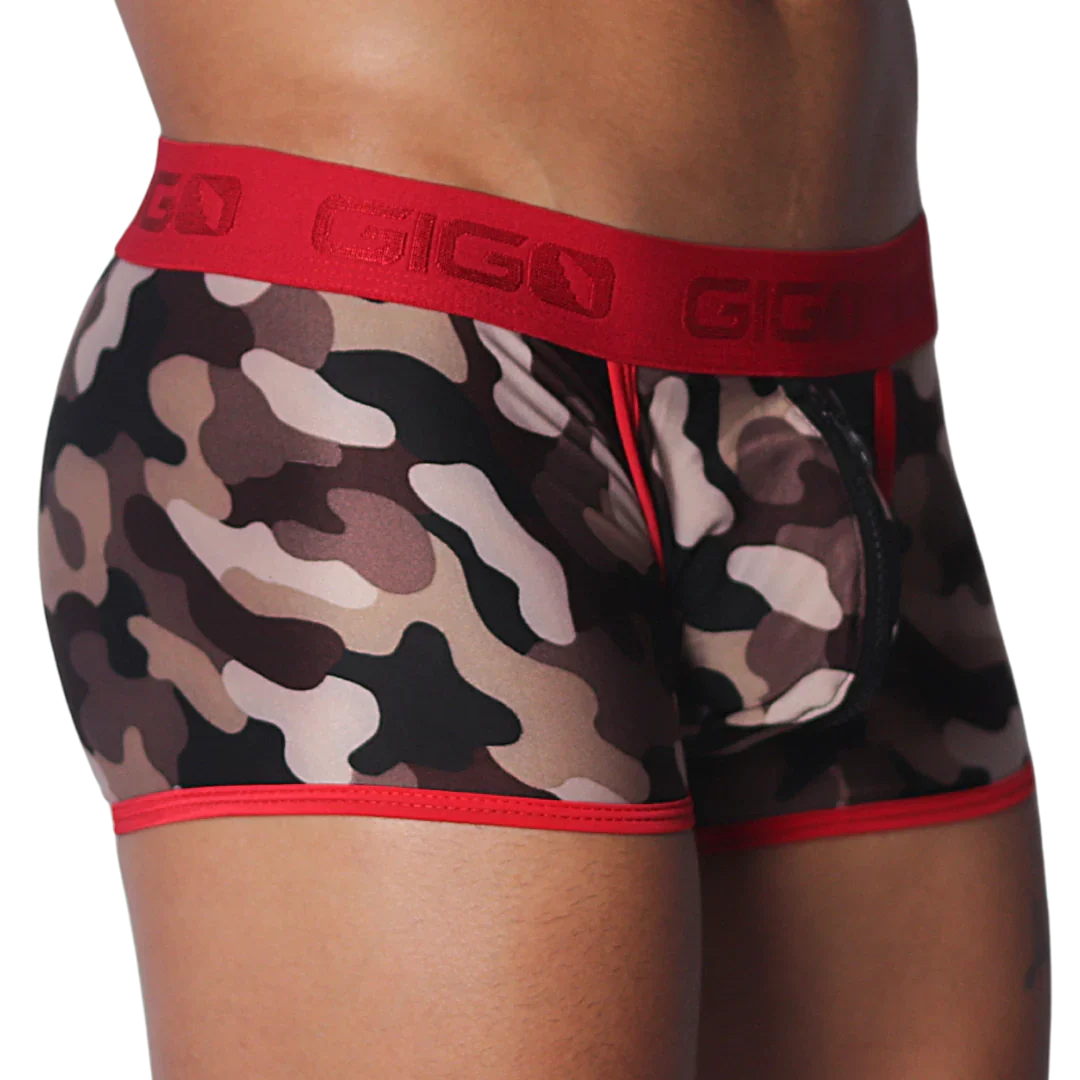 Camouflage print trunks with a red Gigo branded waistband, red trim, and a black zippered front pouch.