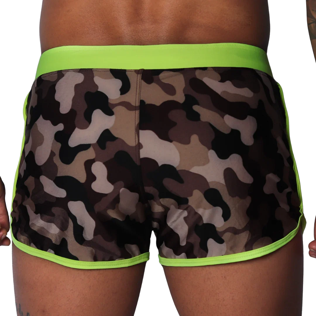 Camouflage print beach shorts with neon yellow waistband and trim, featuring a smooth, athletic fit.