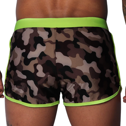 Camouflage print beach shorts with neon yellow waistband and trim, featuring a smooth, athletic fit.