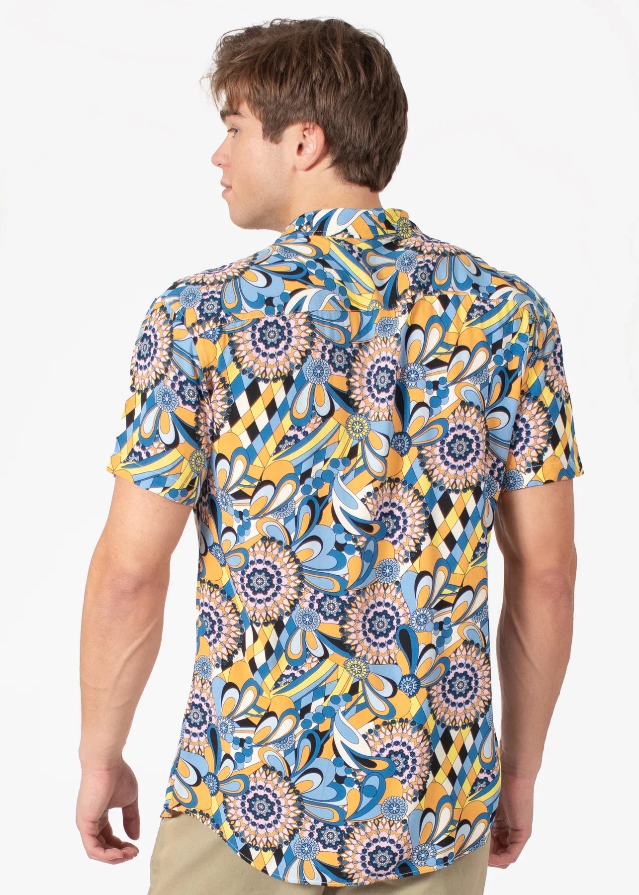 Vibrant blue and yellow floral-patterned tropical abstract short-sleeve button-up shirt with intricate paisley designs