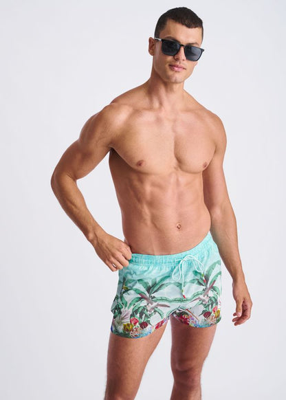 Men’s turquoise tropics print swim shorts with a tropical palm tree and fruit print and mesh lining