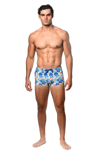 Tropics printed swim trunk featuring blue and white tropical print with a matching blue drawstring for beachwear