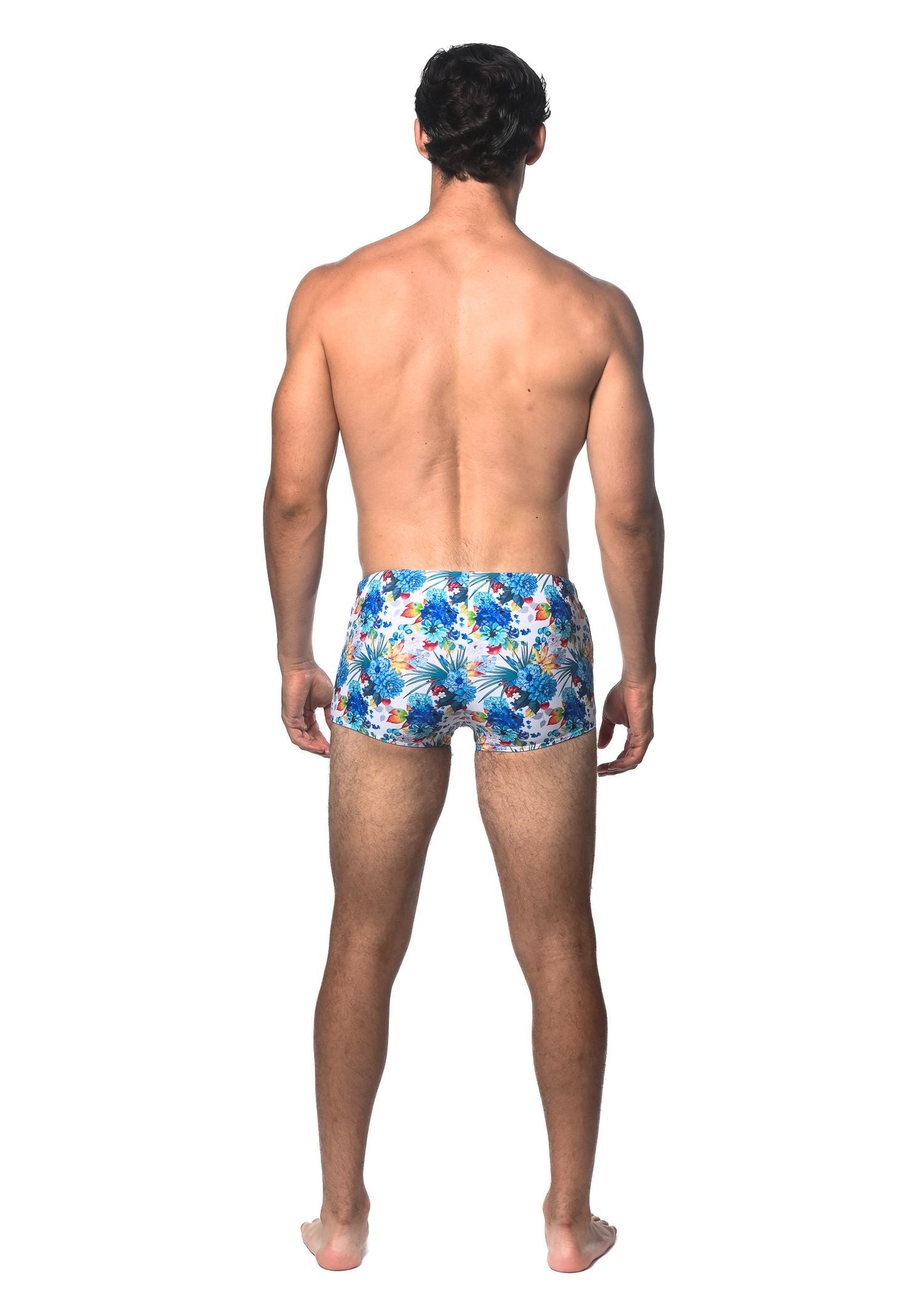 Tropics printed swim trunk featuring blue and white floral pattern designed for comfortable beachwear