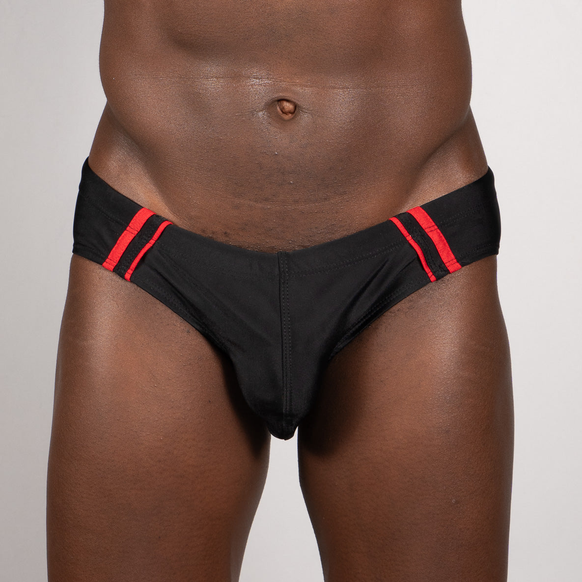 Black tulio brief featuring bold red pipping stripes on the waistband for stylish comfort and support
