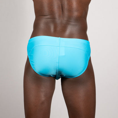 Tulio brief pipping stripe bright turquoise swim trunks with a sleek form-fitting design for swimming and beachwear