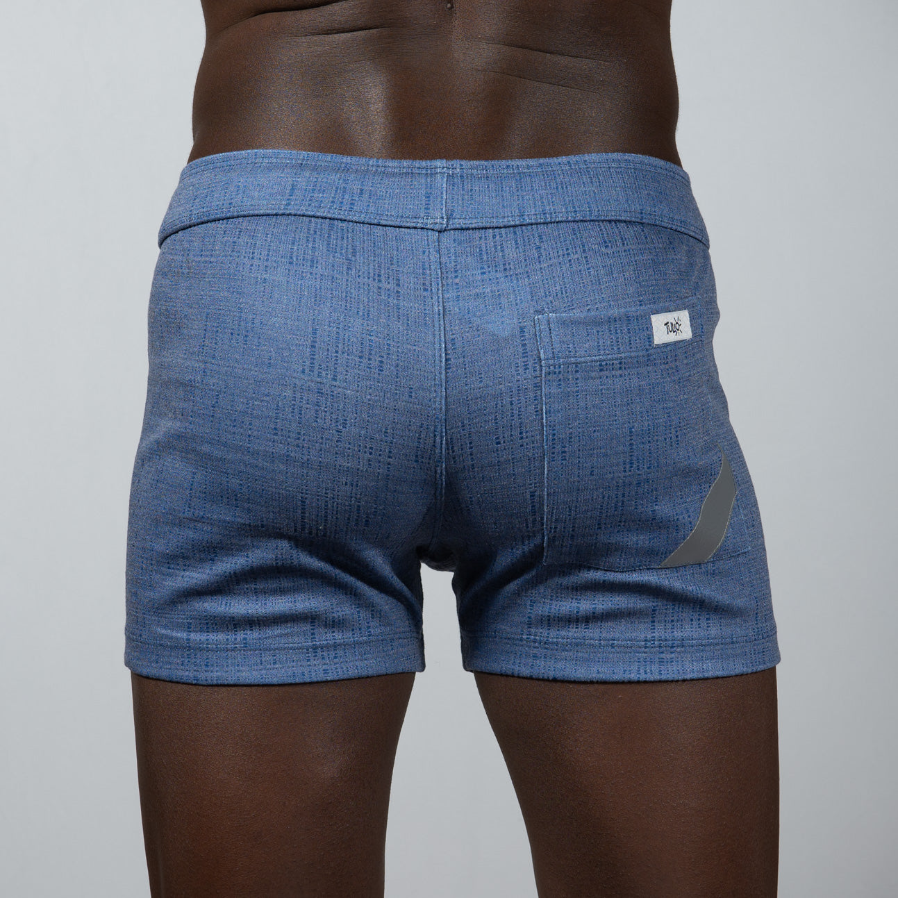 Tulio linen texture shorts in blue with a subtle woven pattern and gray diagonal side accent for casual wear