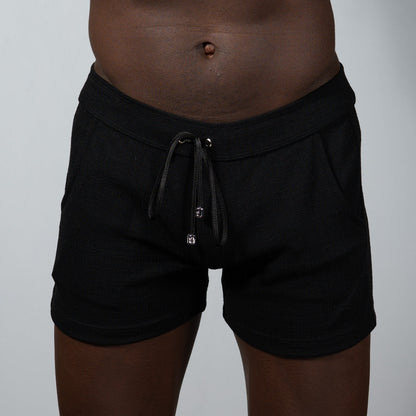 Black tulio linen texture shorts with soft stretchy fabric and subtle side pockets perfect for casual wear