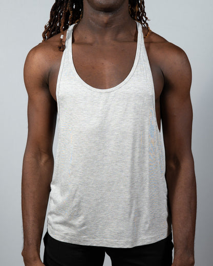 A light gray heathered cotton tulio racerback tank top with a classic racerback design shown from the back side