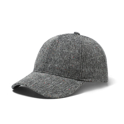 Gray tweed speckled baseball cap with structured crown herringbone pattern and curved brim for casual wear