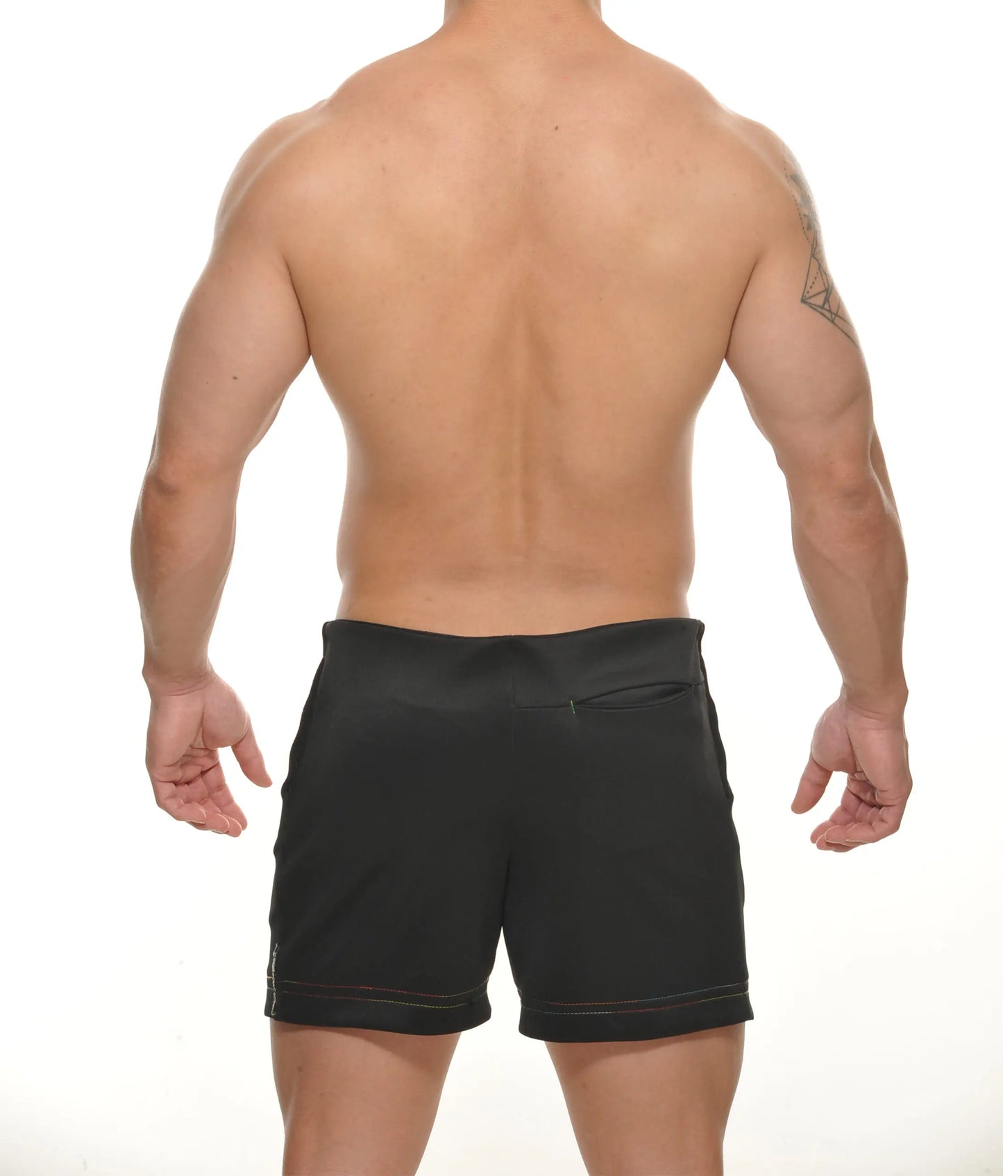 Black TYLER zipper athletic shorts with subtle red stitching detail along the hem for active wear