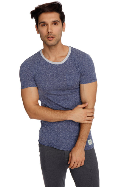 Blue heathered short-sleeve t-shirt with light gray ribbed crew neckline paired with charcoal tactical urban yoga pant