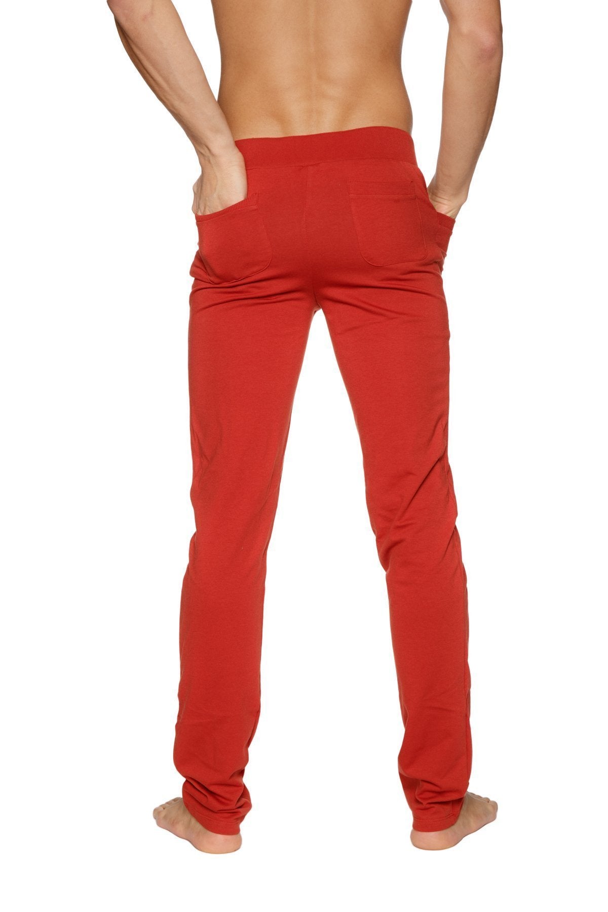 Back view of red cinnabar tactical urban at home dress slim-fit pants in soft stretchy fabric with two back pockets