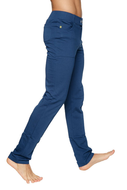 Back view of navy blue tactical urban at home slim-fit dress pant with subtle textured fabric and gold-tone patch