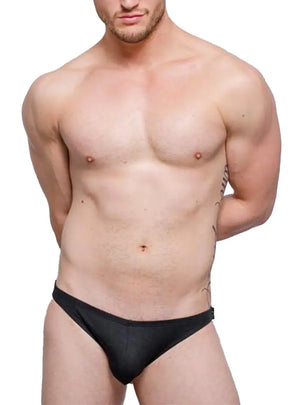 Black snug fit brief by Tartarus featuring a low-rise cut and minimal coverage shown on a model with bare skin.