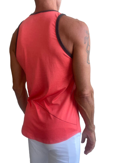 A vibrant coral sleeveless tank top with black trim along neckline and armholes from The Perfect Tank coral