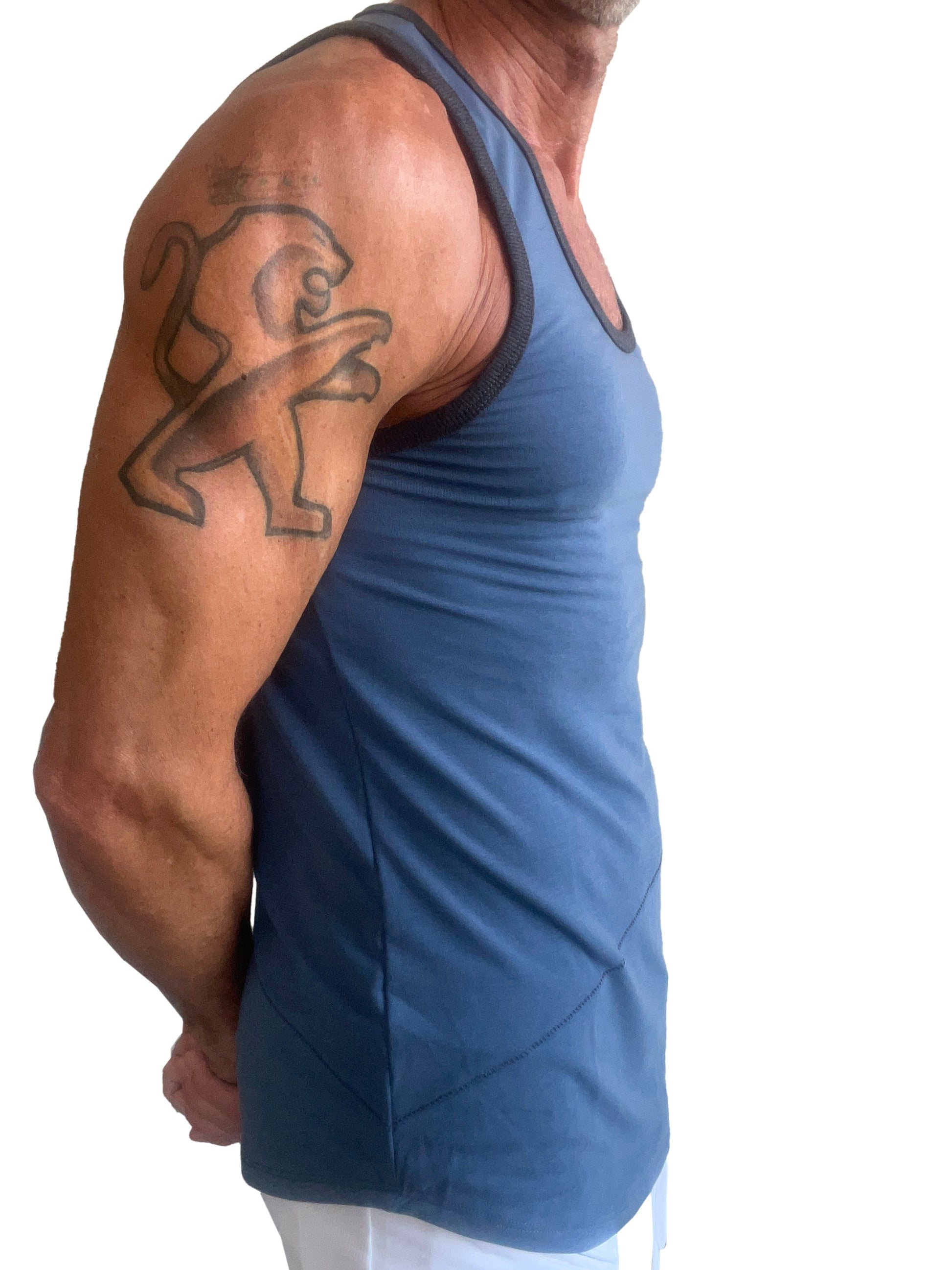 Blue athletic tank top with black trim and subtle geometric panel design the perfect tank denim blue