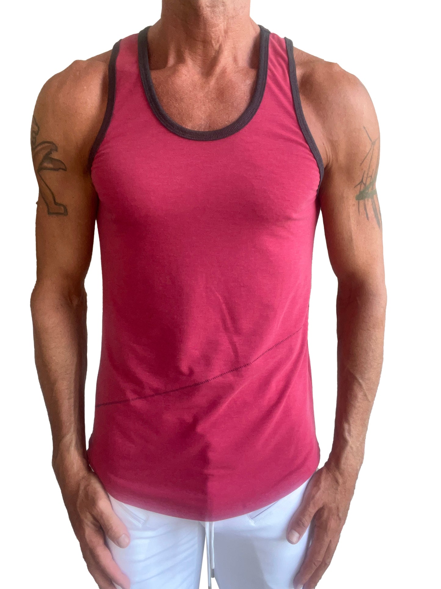 A men’s raspberry red tank top with black trim around neckline and armholes called the perfect tank