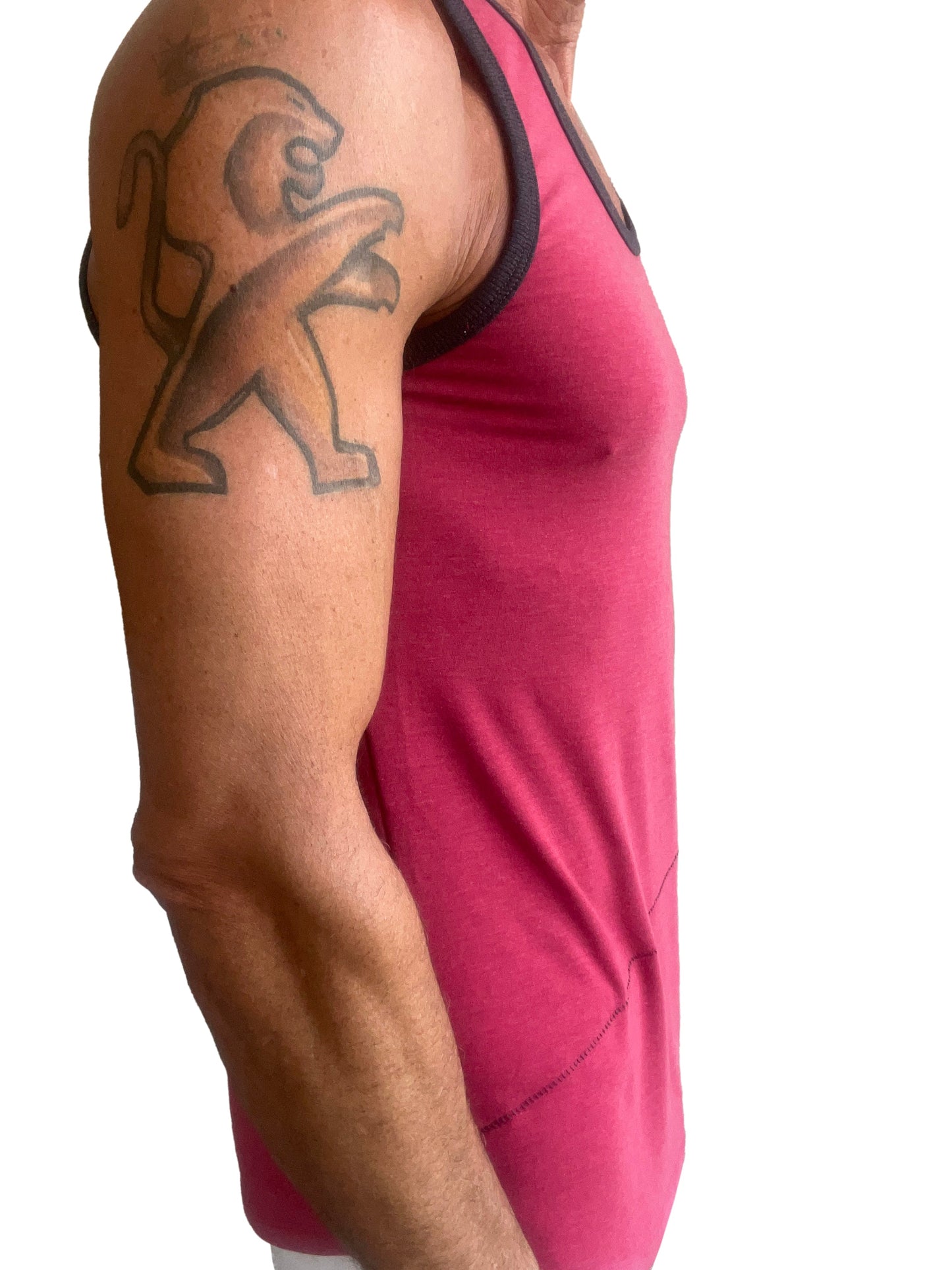 A vibrant raspberry tank top with black trim along neckline and armholes called the perfect tank
