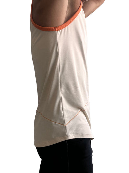 Cream-colored sleeveless tank top with contrasting orange ribbed neckline and matching hem stitching in sand beige