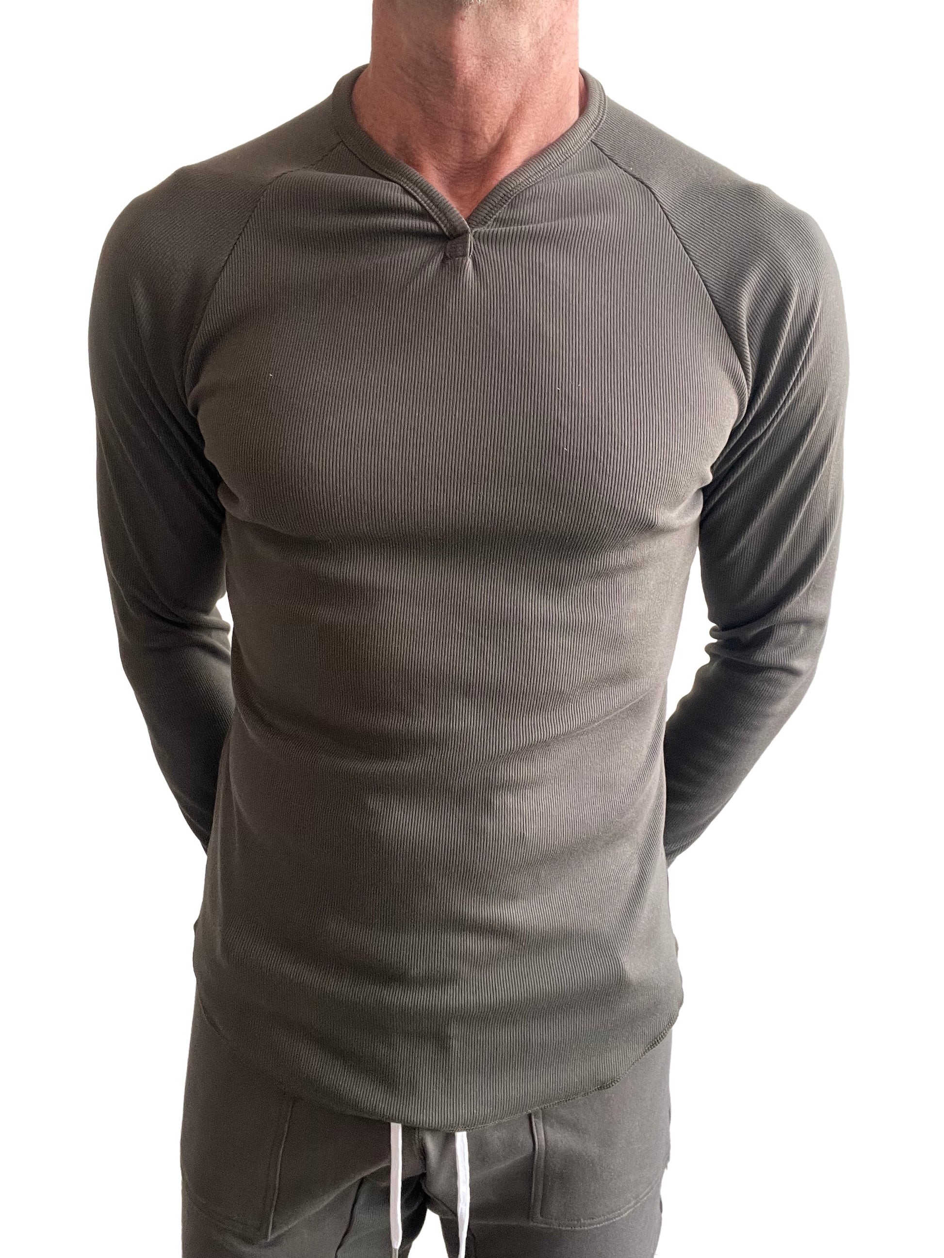 A sleek olive green thermal v neck long sleeve ribbed shirt with a fitted design for warmth and style