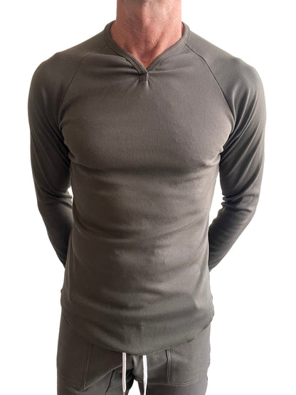 A sleek olive green thermal v neck long sleeve ribbed shirt with a fitted design for warmth and style