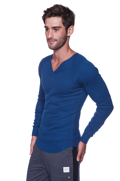 A sleek royal blue thermal v-neck long sleeve shirt made of soft stretchy fabric perfect for layering