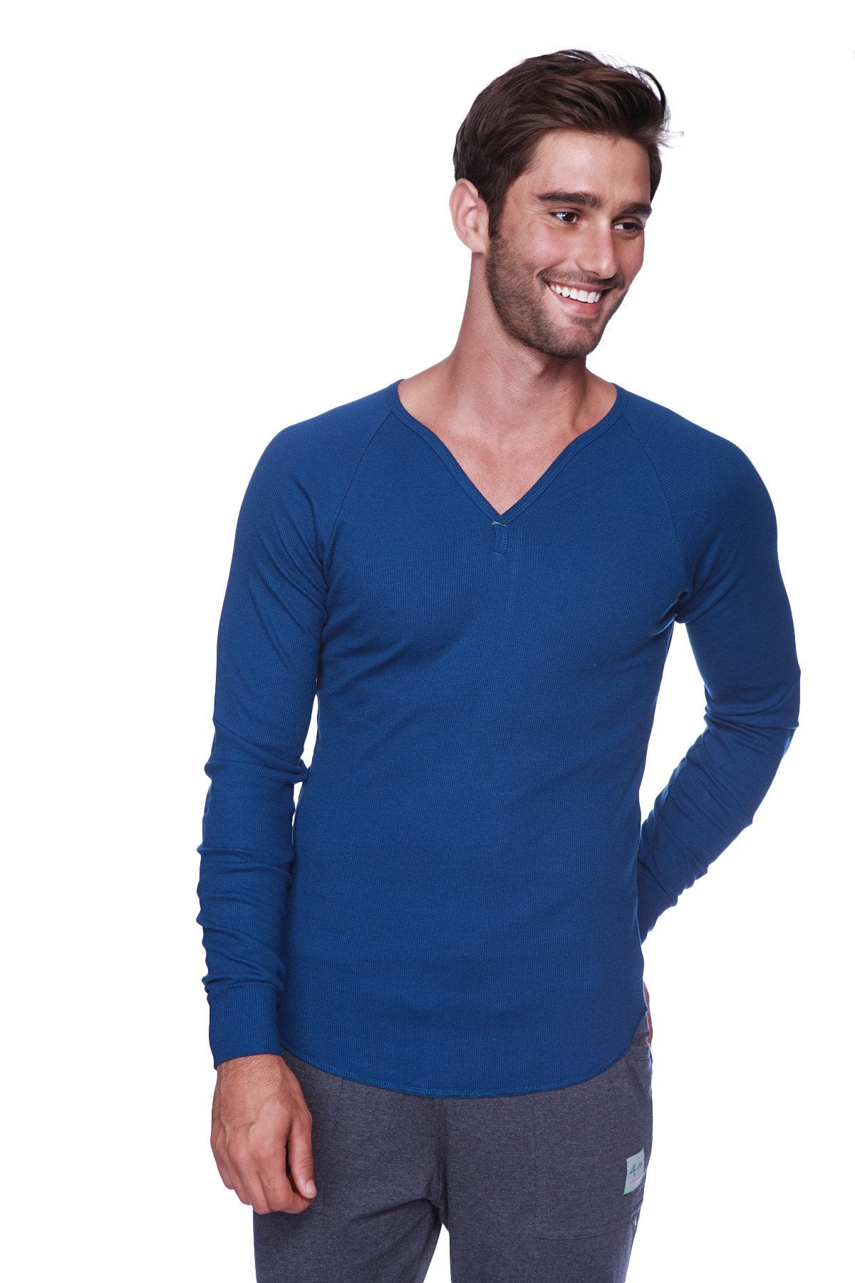 A men’s thermal v-neck long sleeve henley shirt in solid royal blue made from soft stretchy knit fabric