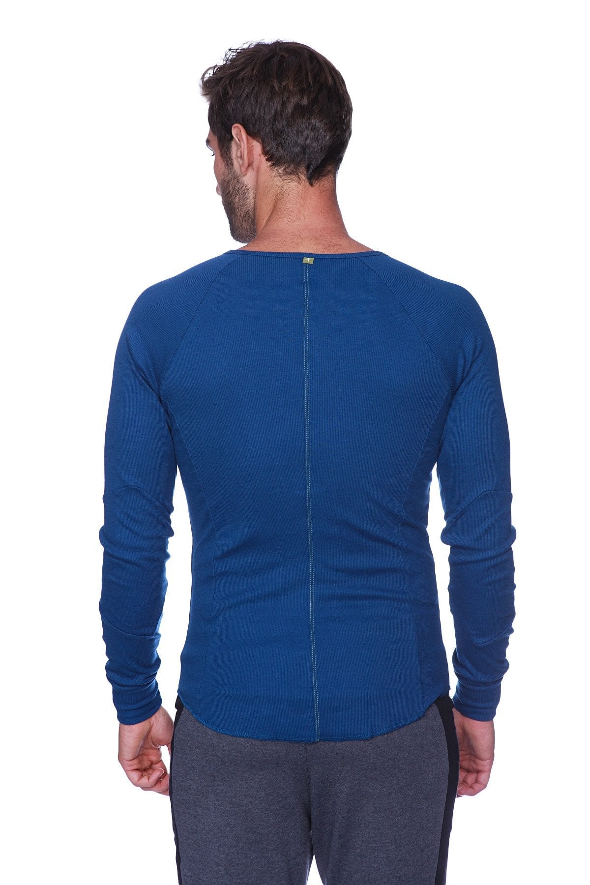Thermal v-neck long sleeve royal blue athletic shirt with ribbed neckline and back zipper shown from the back side