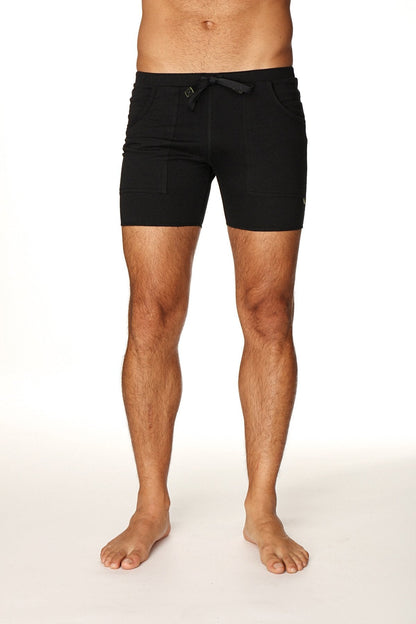 Black transition yoga shorts with sleek minimalist design and subtle waistband branding for active wear