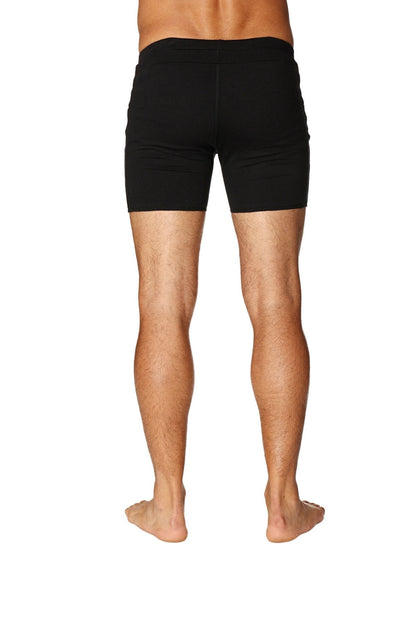 Black transition yoga short with snug fit and elastic waistband designed for athletic comfort and flexibility