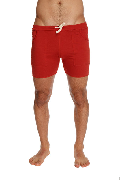 Red transition yoga shorts with white drawstring and two side pockets designed for athletic use