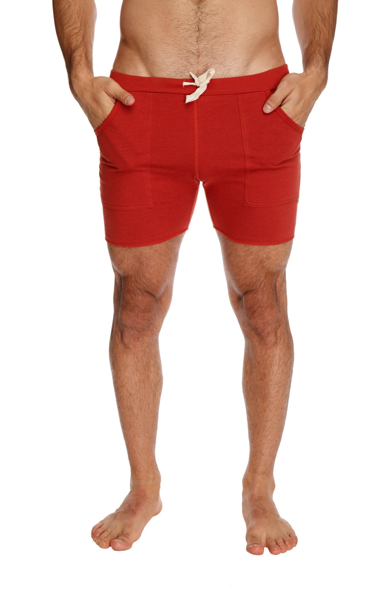 Red transition yoga shorts with drawstring waistband and side pockets designed for athletic use