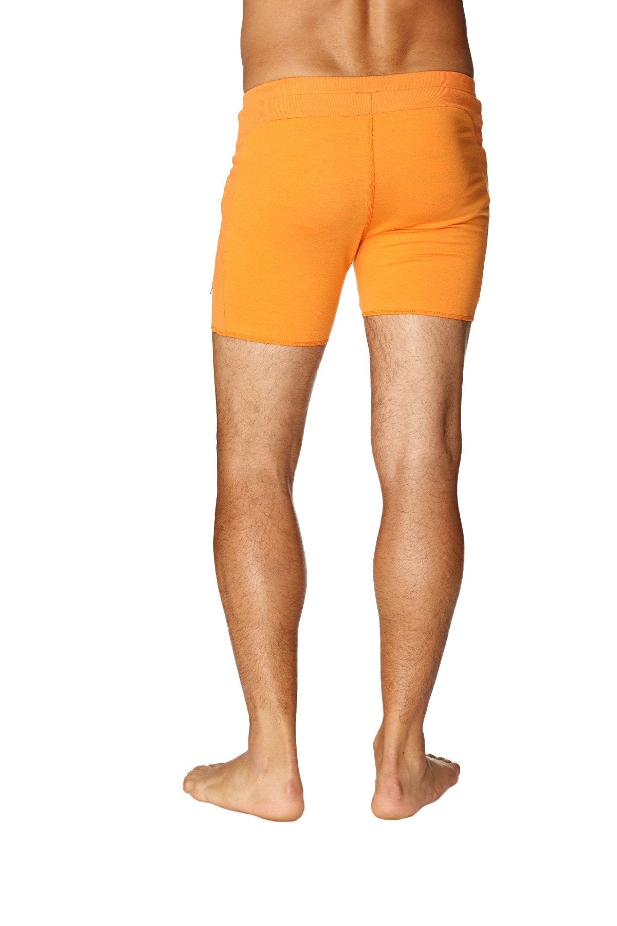 Transition yoga short in sun orange with snug fit and elastic waistband for comfortable athletic wear