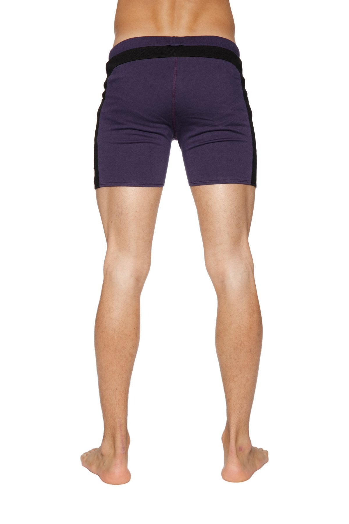 Transition yoga shorts in eggplant with black side stripes and matching elastic waistband for athletic use